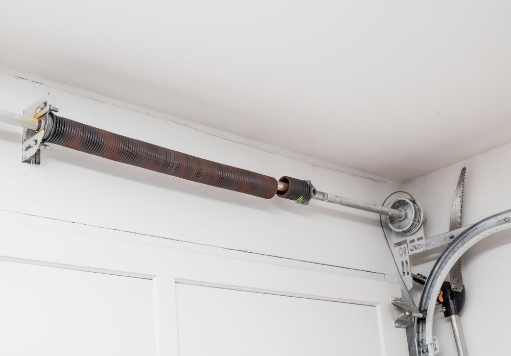 A broken garage door spring.