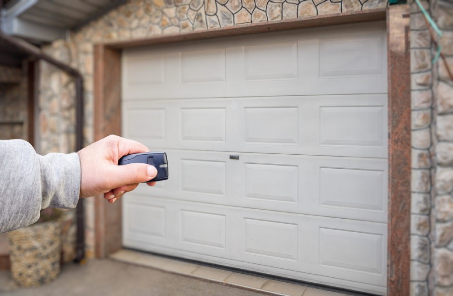 Hand use remote controller for closing and opening garage door